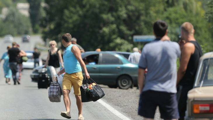 Residents fleeing from Shakhtersk. Photo: Kate Geraghty