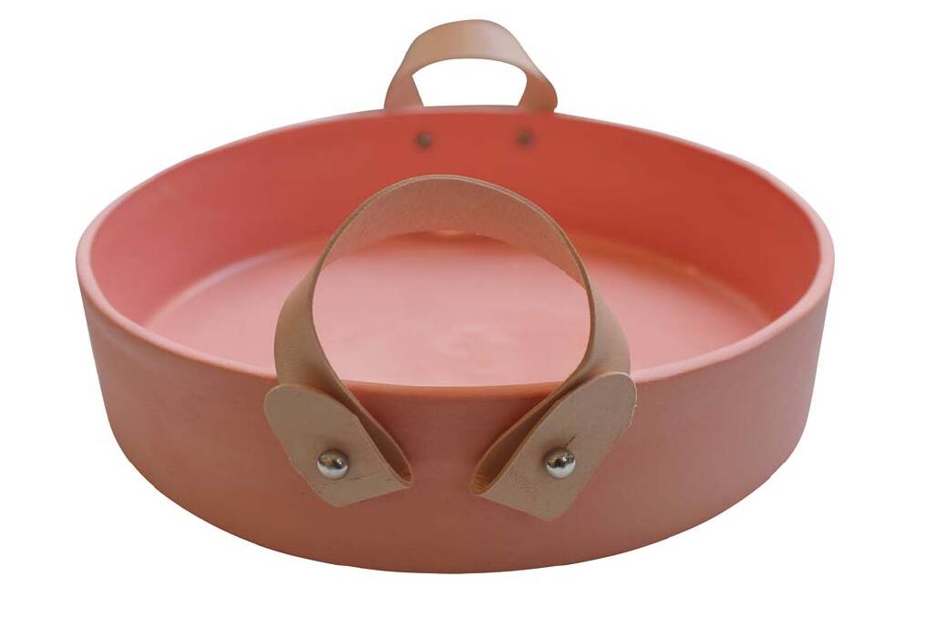 Man handles ... The on-trend leather handles on these salad bowls are detachable for easy cleaning. $89.95, crateexpectations.com.au Photo: Supplied
