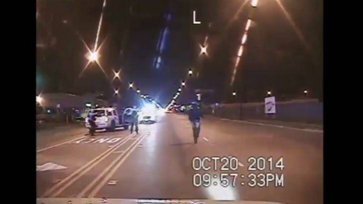 Images from the police dashcam video showing the moments Laquan McDonald was shot. Photo: Screengrab