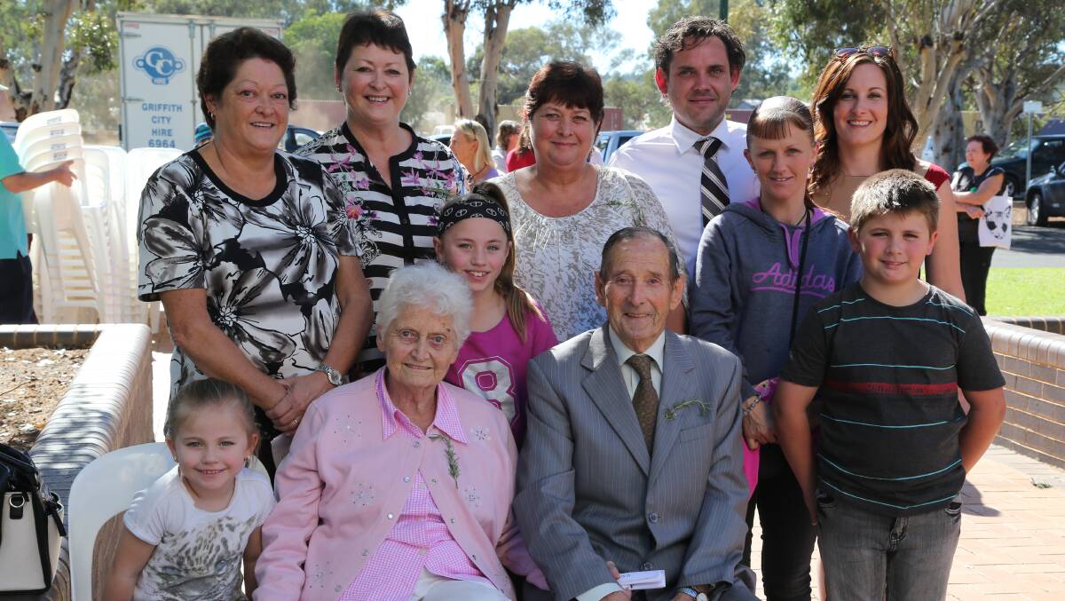 Anzac Day in Griffith. (Back, from left) Ella and Scott Rudkin Mid; Jodie Turner, Maxine Wynne, Kaitlyn Turner,10, Suzanne Turner and Sandra Jonas and (front, from left) Ella Turner, 5, Barbara and Norman Colborne and Jack Turner, 9. Picture: Anthony Stipo 