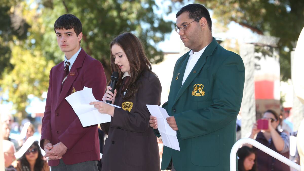Anzac Day in Griffith. School captains - Tristan Agostini from Marion Catholic College, Jennah McCann from Wade High and Callum Meredith from Griffith High - read the names of the fallen soldiers. Picture: Anthony Stipo 