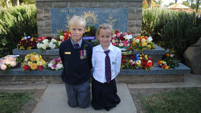 Tom and Heidi Martin at the cenotaph in Henty.