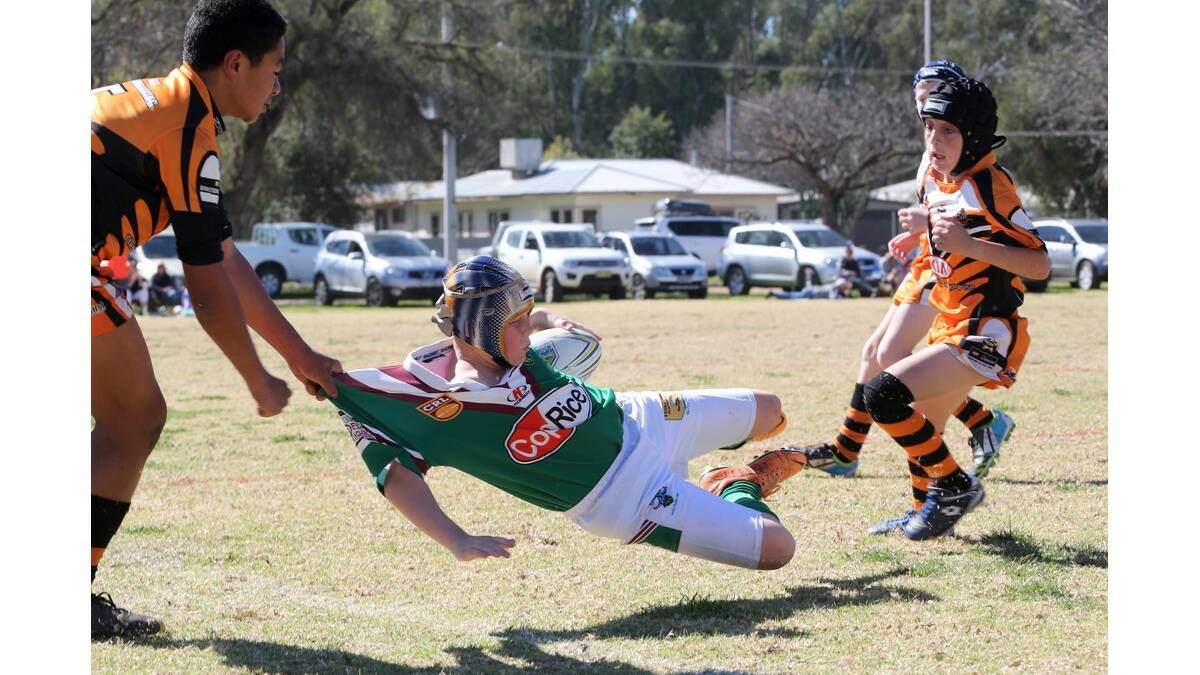 Action from the Leeton and YAHS games at the Group 20 junior grand final day at Darlington Point.