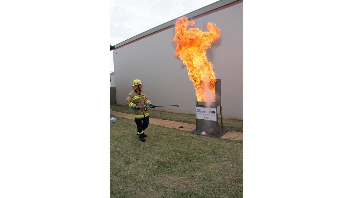 One of the more spectacular highlights of the annual NSW Fire & Rescue Leeton station open day is the kitchen fire simulator, which show what happens if you pour water on an oil fire.