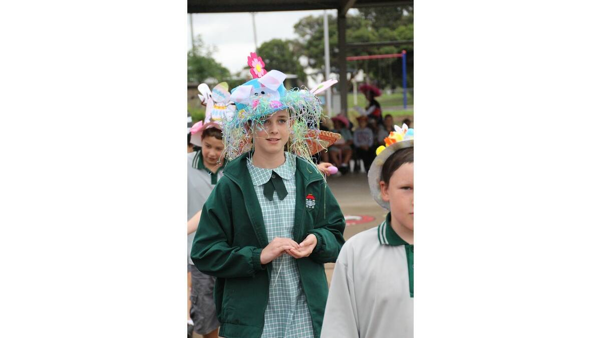 Portia Marks (10) shares her unique creation at the Parkview Public Easter hat parade.
