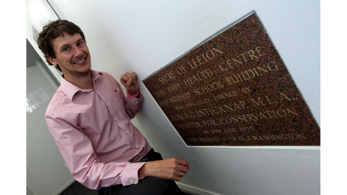 LEETON Shire Council community services officer Jackson Goman with the plaque for the opening of the original baby health centre that the new building has incorporated. A new plaque will be placed for the official opening of the new centre.