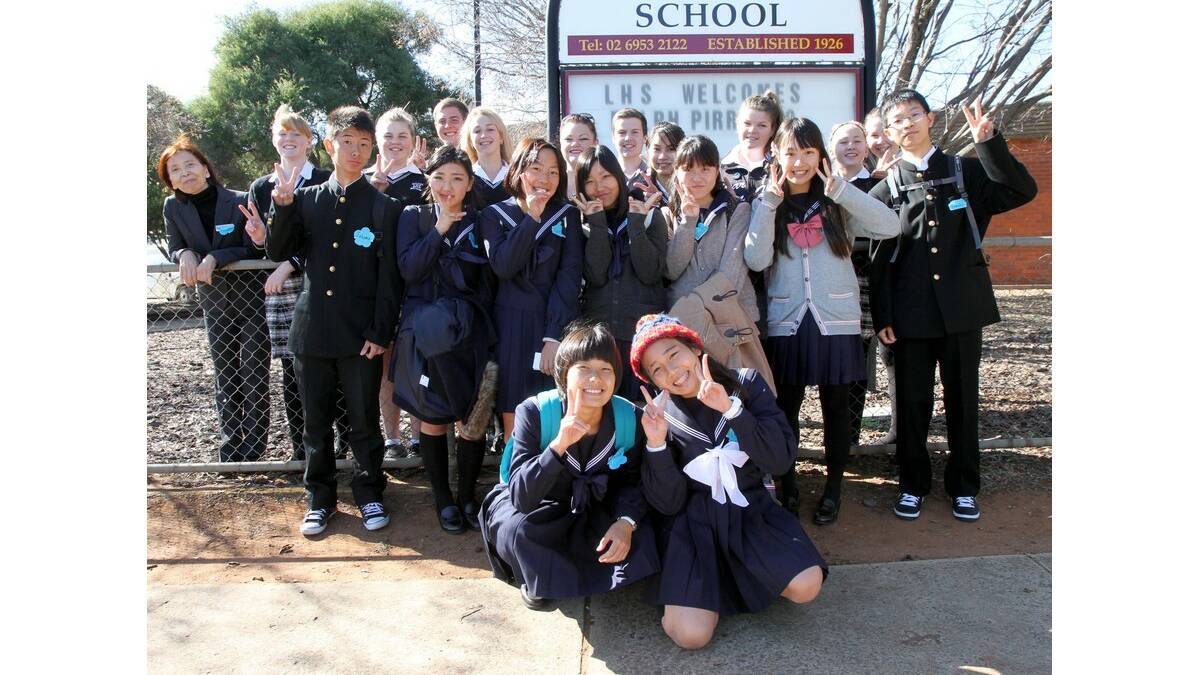 VISITING students from Tondabayashi Senior High School pose with host students outside Leeton High School.