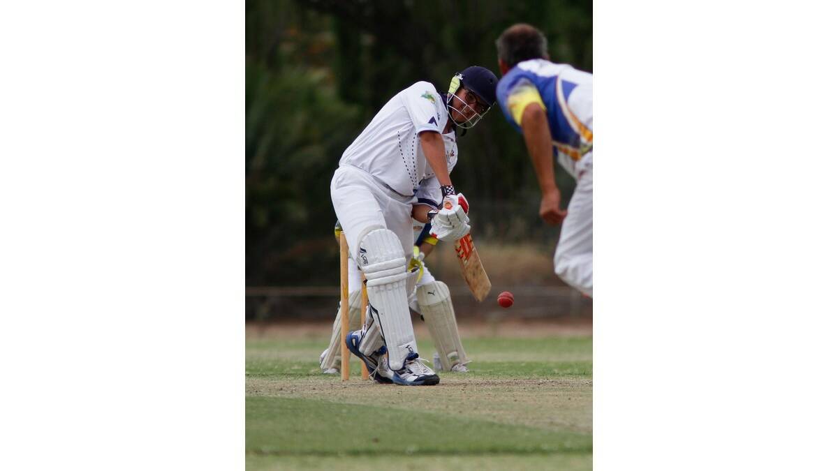 NATHAN Lanham tries to hold up the middle order for Yanco Hotel.