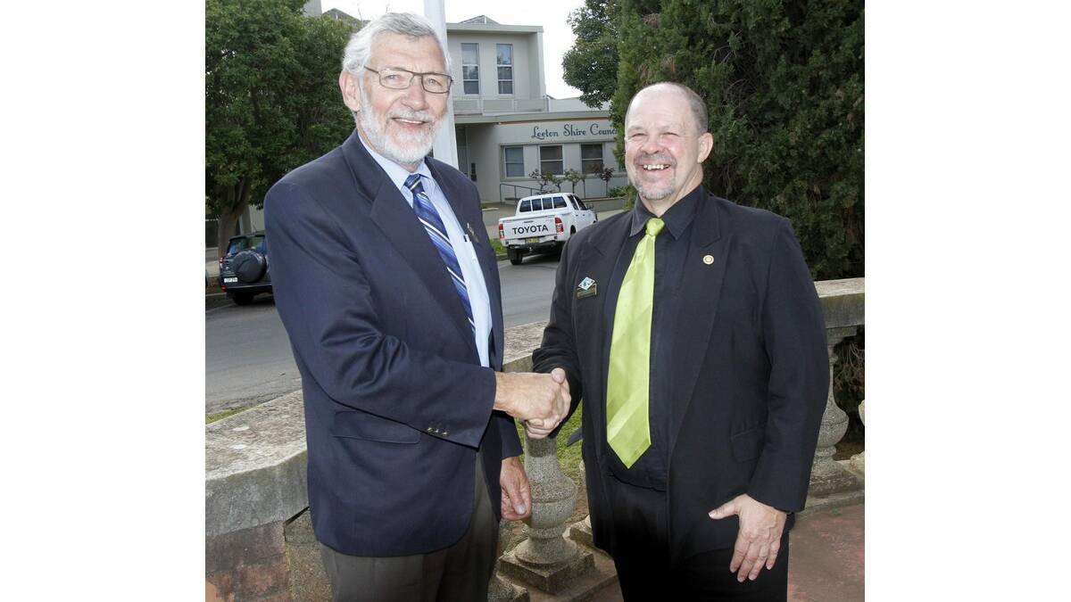 MAYOR Paul Maytom (left) congratulates his deputy George Weston on being returned to the position for another term.