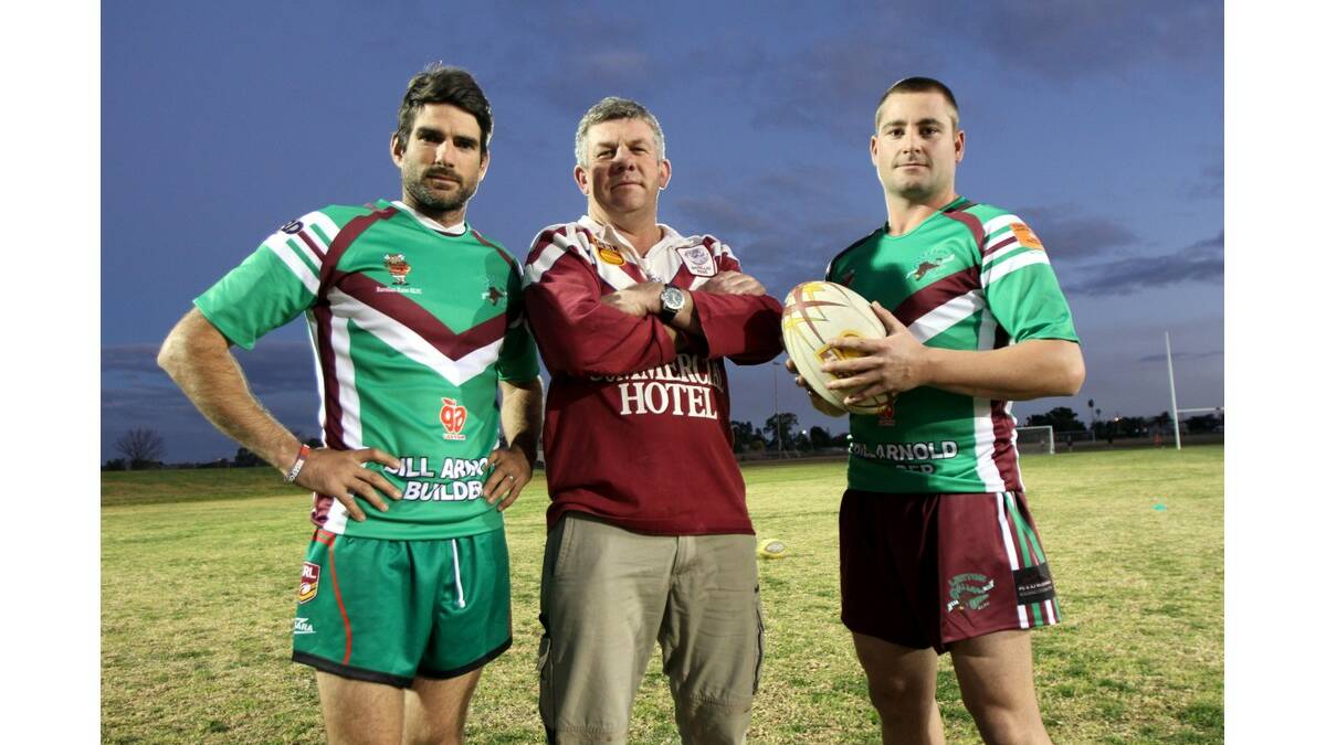 BARELLAN-BRED Leeton players Clint Halden (left) and Ben Evans (right) show off the combined Rams-Greens jumper they will wear in first grade on Sunday, while recruiting manager Paul McDonell wears his Rams jumper from 1999, when they won the coveted Clayton Cup.