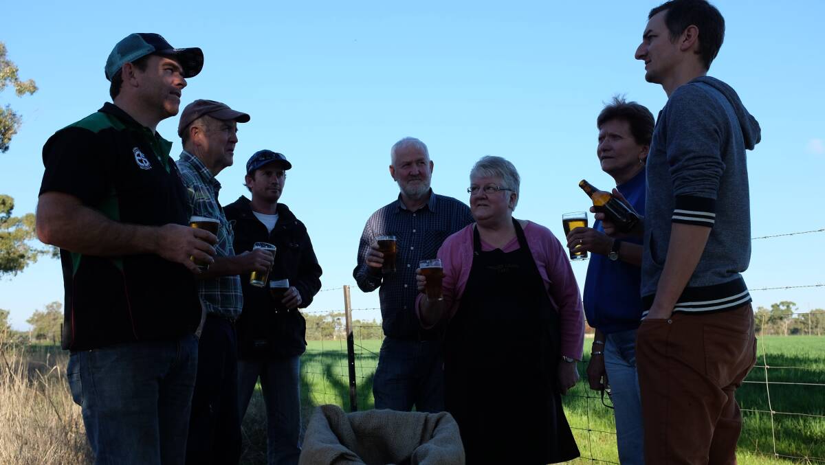 Barellan community members get behind the brew. (from left)  Jay Bandy, Emil White, Brent Danaher, Ken Whytcross, Beth Preston, Heather White and Stuart Whytcross.
