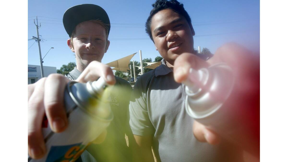 ETHAN Lord (left) and Shane Nikoro show off their skills in preparation for the street art workshop.