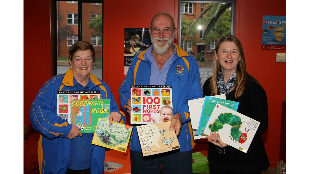 LAUNCHING the Leeton Lions Club's literacy program recently was (from left) Lions Club president Maureen Smith, co-ordinator Col Attree and library assistant Jo Pianca. 
