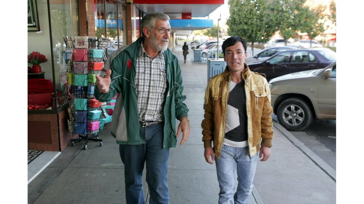 LEETON mayor Paul Maytom and Afghani translator Abdullah Nazari  discuss this weekend's multicultural community celebration. Both men are also part of a refugee support group that has been formed in Leeton.