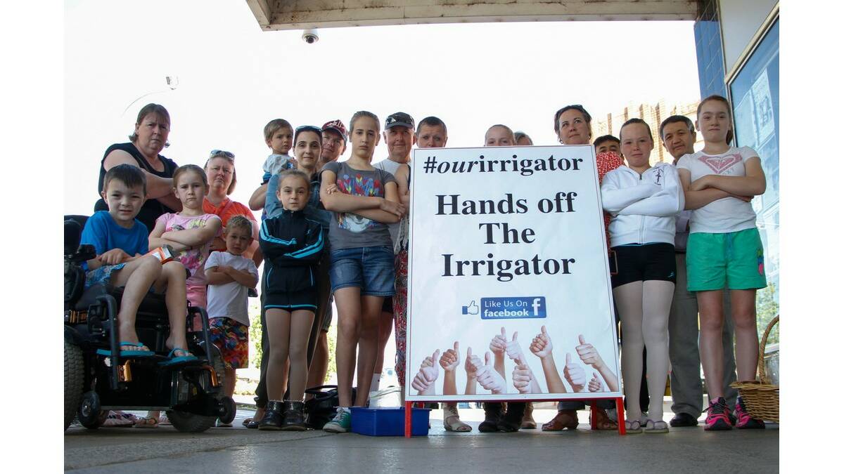 RESIDENTS display their concern about proposed changes at The Irrigator.