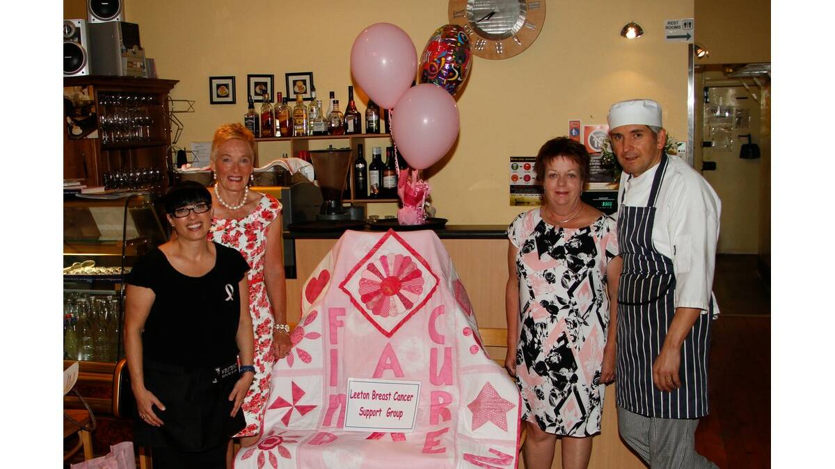 LEETON Breast Cancer Support Group members Laney Lashbrook-Gough (second from left) and Sue Brett (second from right) thank Vanessa and Eric Pages for their continued support.