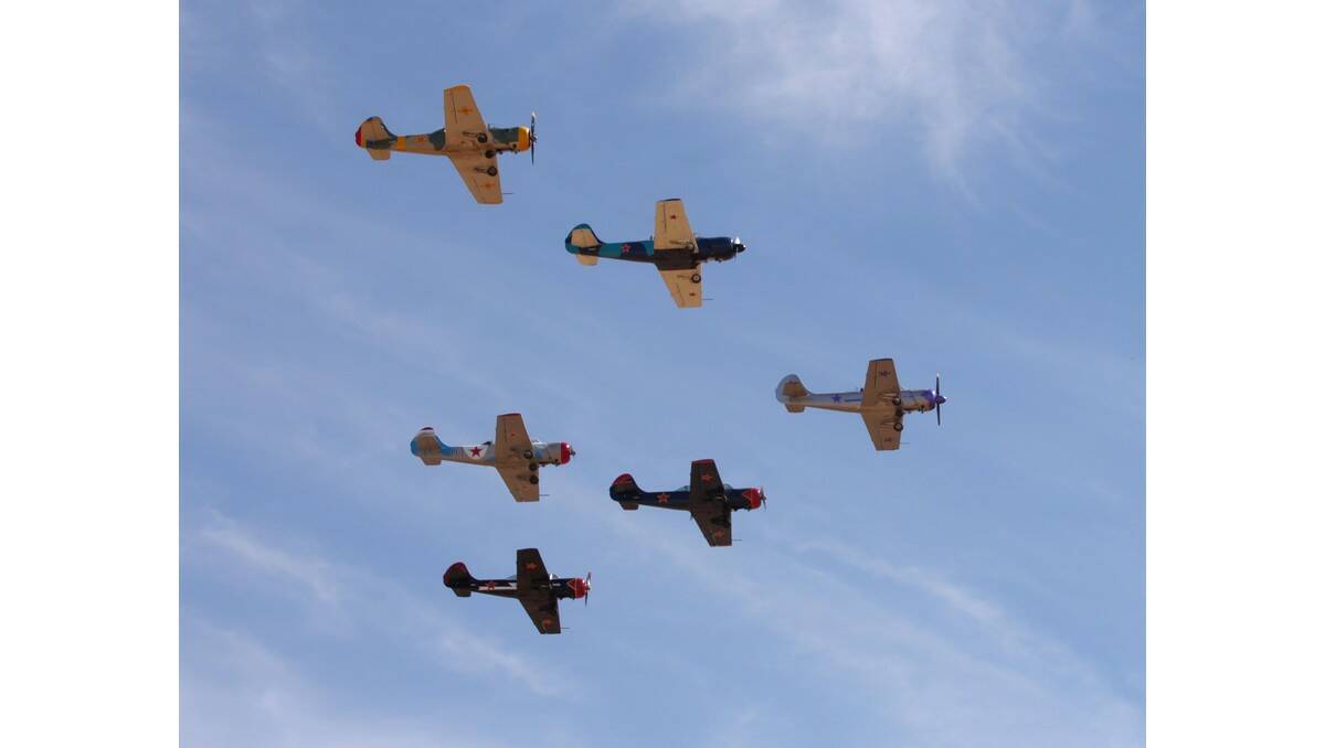 REMAINING Red Radials group members flew out of Leeton in formation on Saturday morning on their way to Temora.
