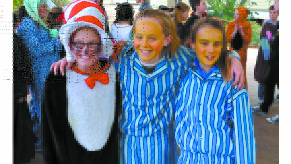 LEETON Public School students (from left) Molly Dale, Makayla Broadbent and Taelah Jackson enjoy the Book Week character parade last Tuesday.