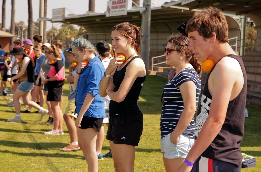 PARTICIPANTS in the Bidgee Binge Amazing Race event prepare for the orange relay.