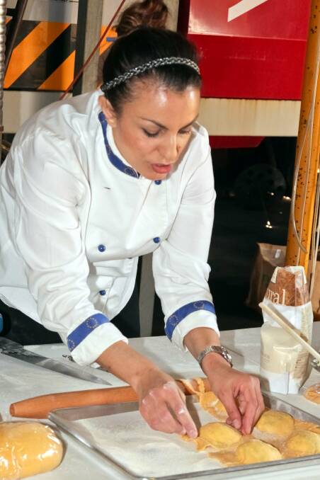 MELINA Puntoriero demonstrates cooking techniques during Lillypilly Estate Winery's Taste Riverina event recently.