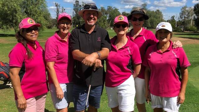 ALL SMILES HERE: Previous participants of a charity golf day at Leeton Golf Course. PHOTO: Jason Mimmo