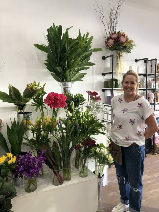 BRIGHT AND CHEERY: Florist Kerry Cornes has opened Arbour and Ivy Flowers in Pine Avenue. PHOTO: Lizzie Gracie
