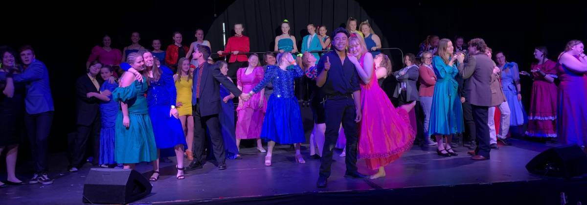 EXCITED TO BE BACK ON STAGE: Students at Leeton High School in 'Back to the 80s', the last musical the school held in 2019 PHOTO: Contributed
