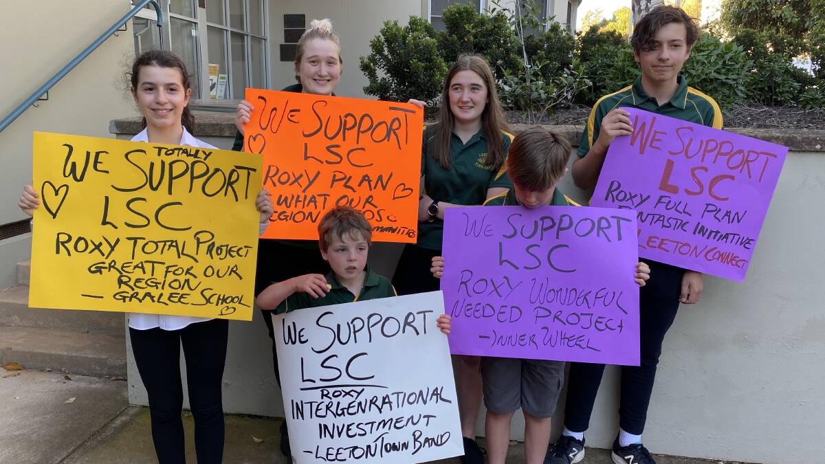 AT THE HEARY OF LEETON: Community members showed their support for the redevelopment of the Roxy Theatre to go ahead in full capacity outside Council Chambers. PHOTO: Supplied