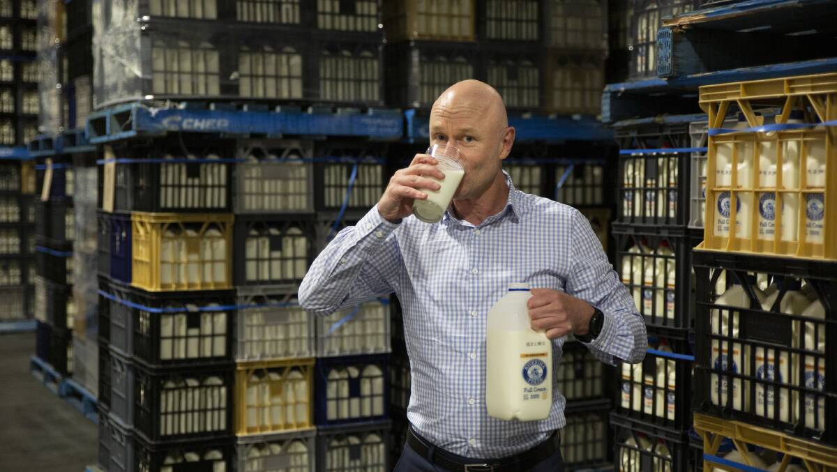 BIG DRINK: Riverina Fresh CEO Rob Collier celebrates as the dairy producer brings up its century in 2022. PHOTO: Madeline Begley 