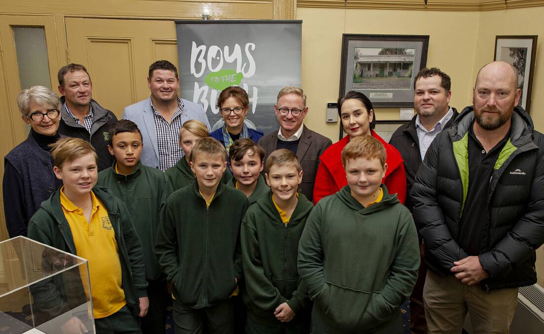 BOYS TO MEN: Regional youth minister Ben Franklin (back, centre) wants Boys to the Bush to build positive outcomes for youth, families and their communities. PHOTO: Contributed