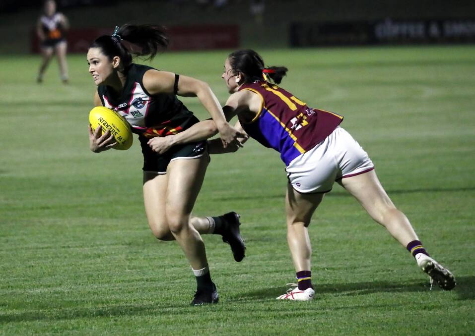 Georgina Carroll is tackled by Angela Fisher during the 2023 Southern NSW Women's League grand final. Picture by Les Smith