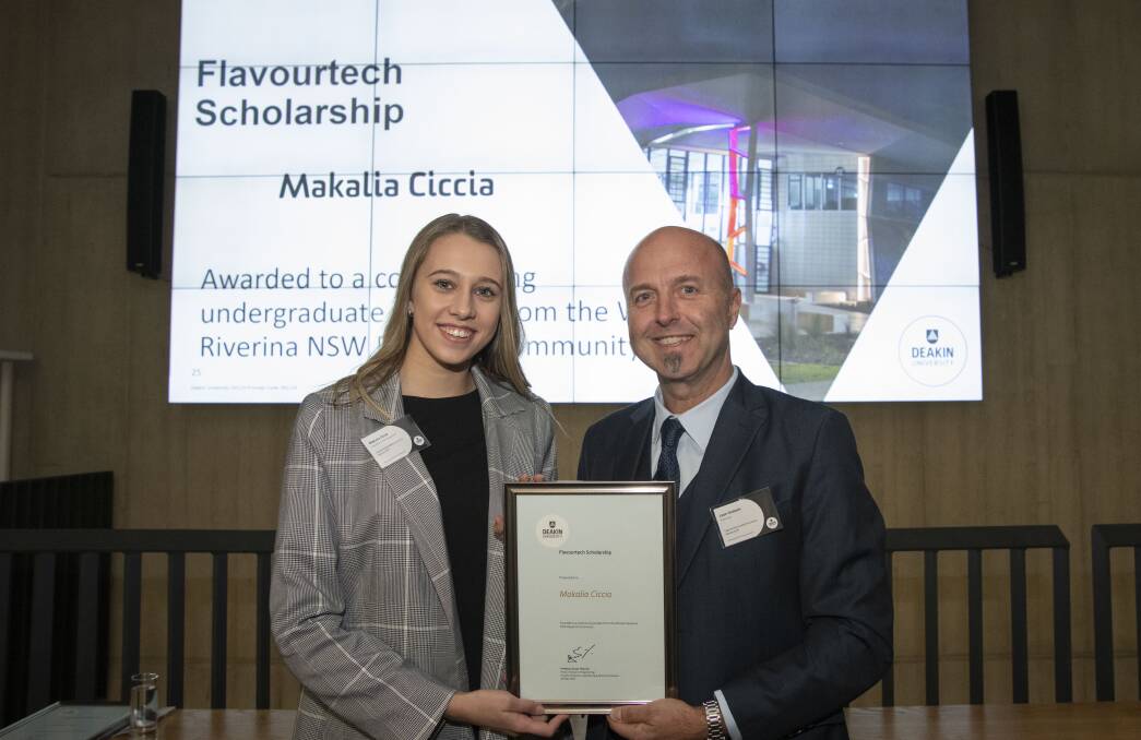 HOME GROWN TALENT: St Francis graduate Makalia Ciccia receives a scholarship from Flavourtech sales and marketing director Leon Skaliotis. PHOTO: Contributed