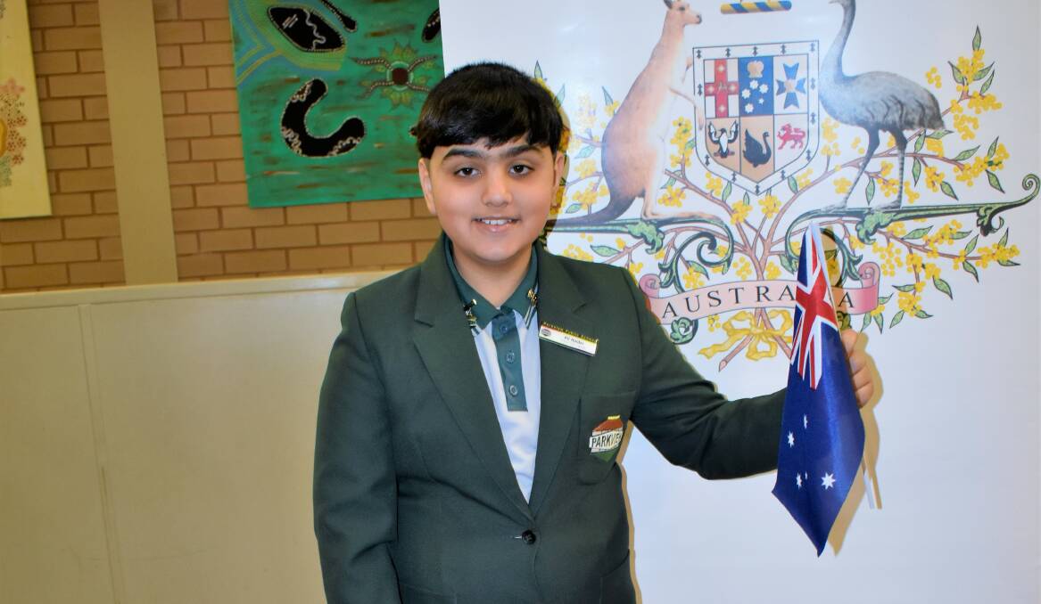 TRUE BLUE AUSSIE: Year 6 student Ali Haider officially became an Australian at Parkview Public School's citizenship ceremony on Thursday. PHOTO: Kenji Sato