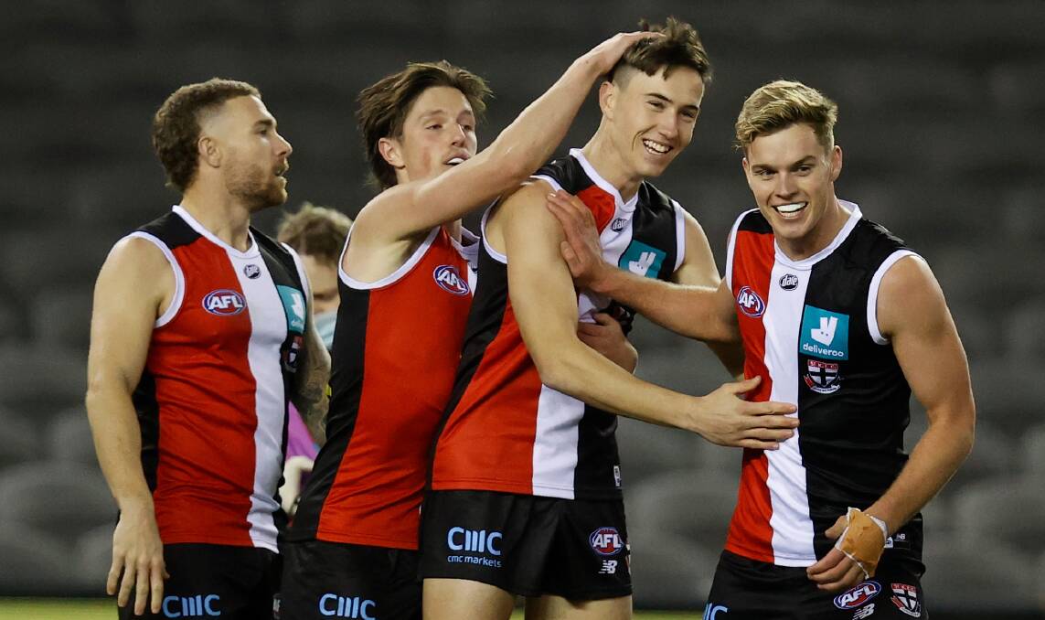 LOCKED IN: Leeton product Cooper Sharman (third from left) has grabbed his chance at St Kilda, and has been rewarded with a two-year deal. Picture: Getty Images 
