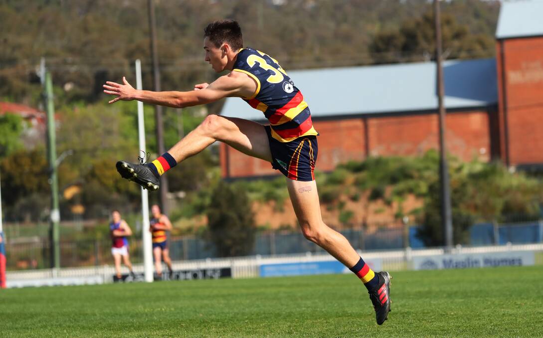 FLYING CROW: Leeton-Whitton's Cooper Sharman goes on the attack during last week's preliminary final win over Ganmain-Grong Grong-Matong. Picture: Emma Hillier