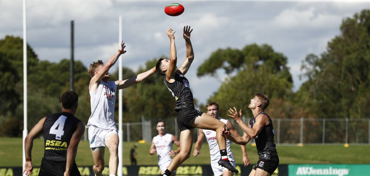 UP THERE: Cooper Sharman takes a hanger during St Kilda's intra-club trial last month. Picture: Darrian Traynor/Getty Images 