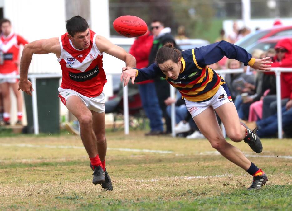 RACE IS ON: Collingullie-GP's Tom Keogh and Leeton-Whitton's Cooper Sharman compete at Crossroads Oval on Saturday. Picture: Les Smith