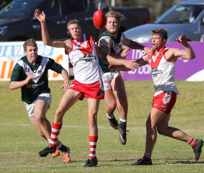 LATE INCLUSION: Griffith ruckman Riley Irvin (second from left)
has been added to the Riverina League squad for Saturday's
representative showdown with Farrer League. Picture: Les Smith