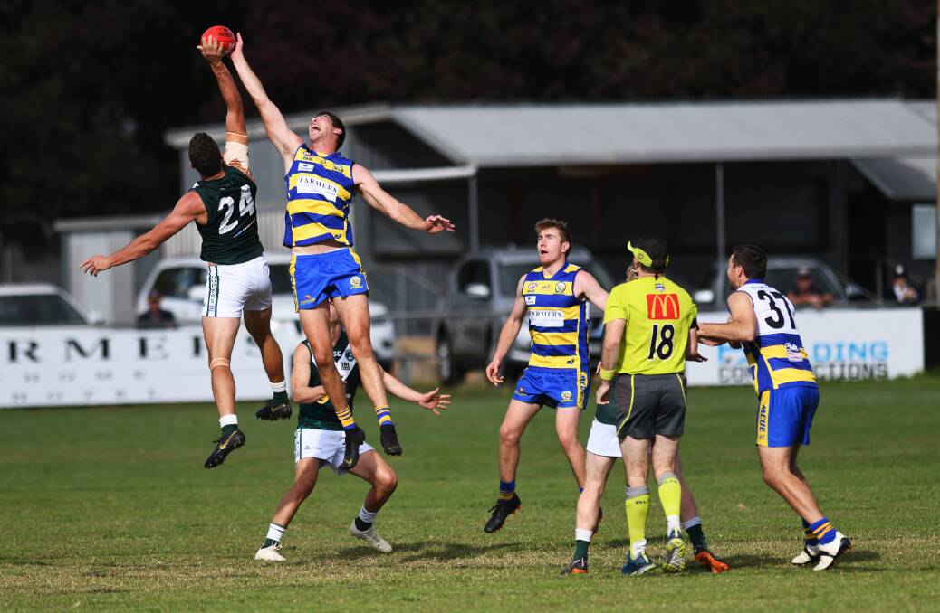 UNCERTAIN TIMES: A Riverina League game between Coolamon and Mangoplah-Cookardinia United-Eastlakes last year. AFL Riverina chairman Michael Irons has warned paid players that they may not be paid for games this year. 