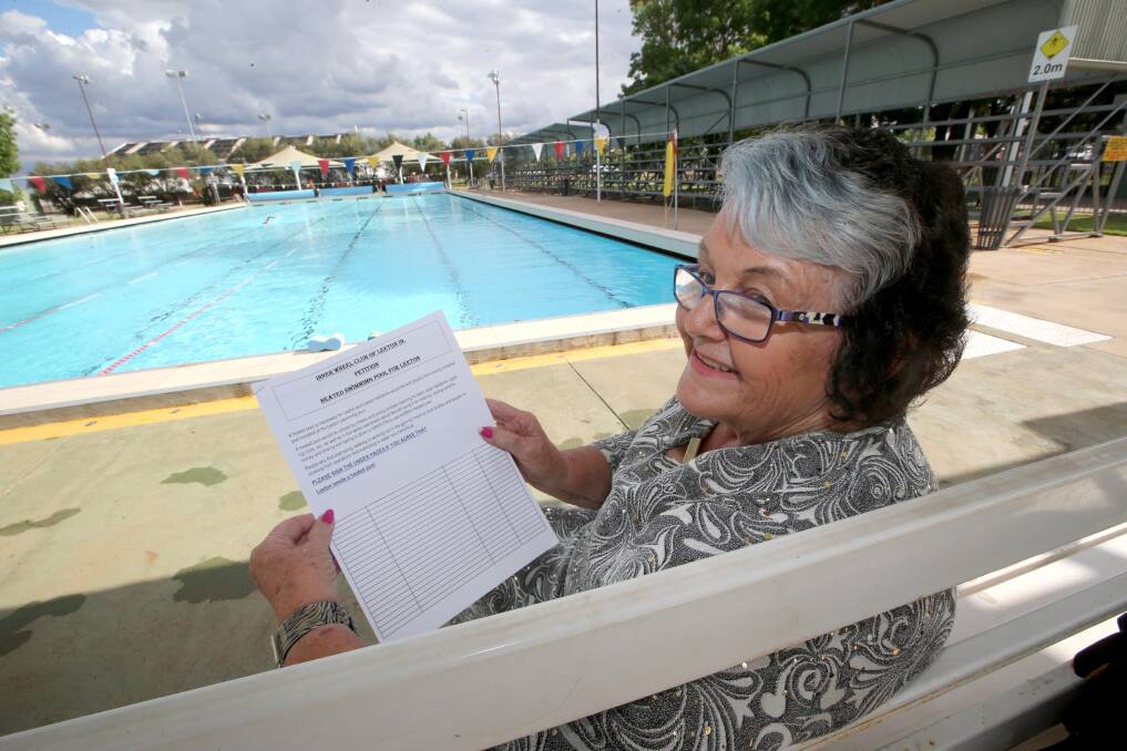 JUMP IN: Leeton Inner Wheel president Margaret Henman says the petition to get Leeton's public pool heated will be available in most shops next week. Picture: Anthony Stipo