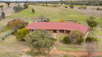 SPACE: 'Little Plains' in Narrandera has a large family living room, ideal for entertaining or bringing the whole family together to watch a movie beside the integrated fireplace. Photos: Supplied
