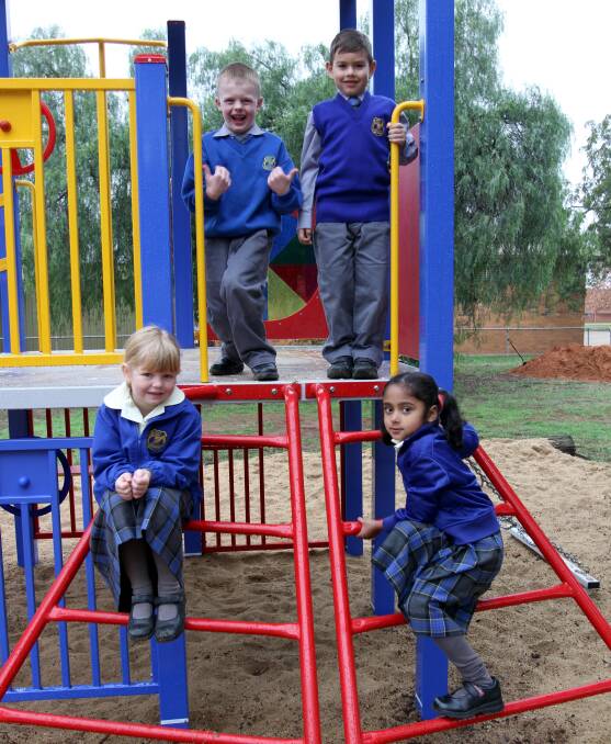 CURRENT kinders (from left) Sophie O'Callaghan, Luke Bechaz, Raffaele Mallamace and Halima Bushra are happy to be at Leeton Public School.