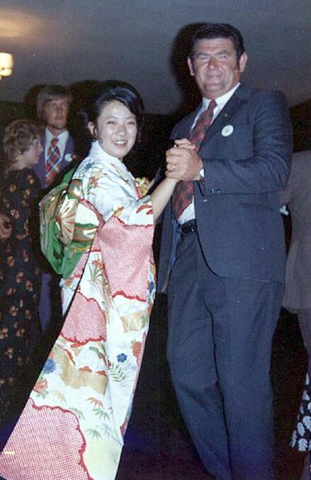 NEVILLE Hunt dances with exchange student Norieko at a ball to celebrate the opening of Allambie School.
