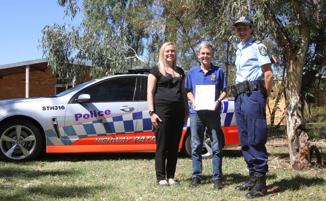 LEETON Shire Council road safety and traffic officer Steph Puntoriero (left) and school liaison officer Lauren Blom (right) with YAHS student Max Hatty who last year became the 3000th student to complete the RYDA program.