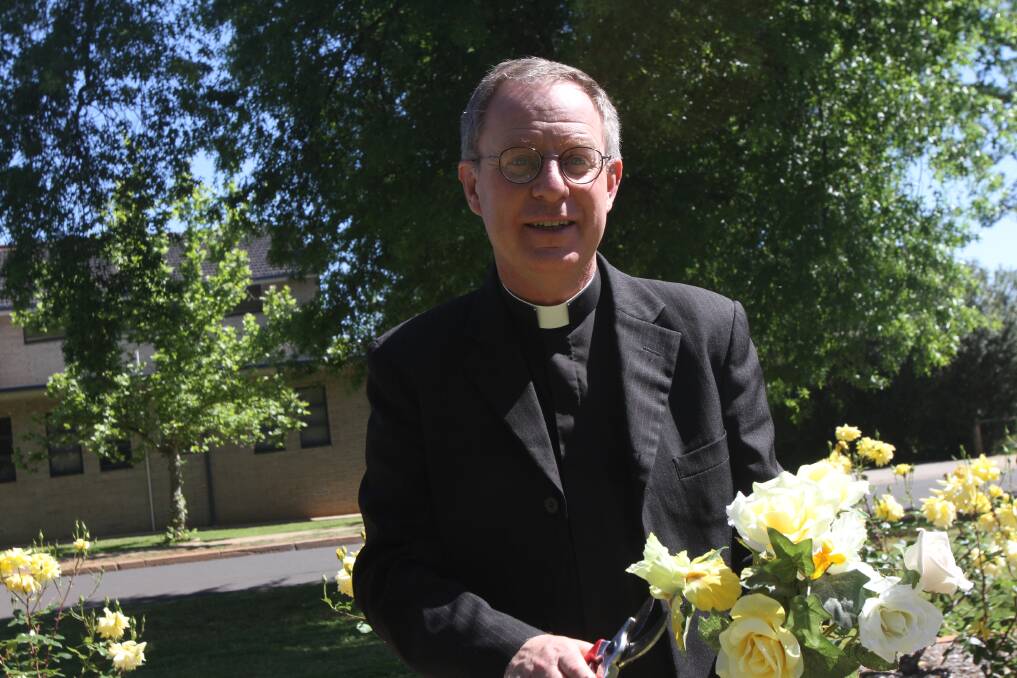IN FULL BLOOM: Fr Robert Murphy is looking forward to seeing the community come out on Saturday PHOTO: Jessica Coates