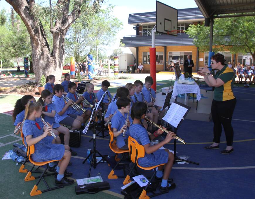 The crowd were treated to the music of the St. Joseph's school band at the opening ceremony. PHOTO: Jessica Coates