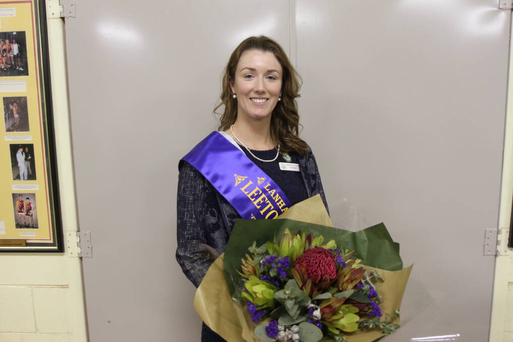 WINNING AND GRINNING: Liz Munn took out the coveted Leeton Showgirl title. Her parents travelled to Leeton for the occasion. Ms Munn has been President of the Leeton Show Society for the past two years.
