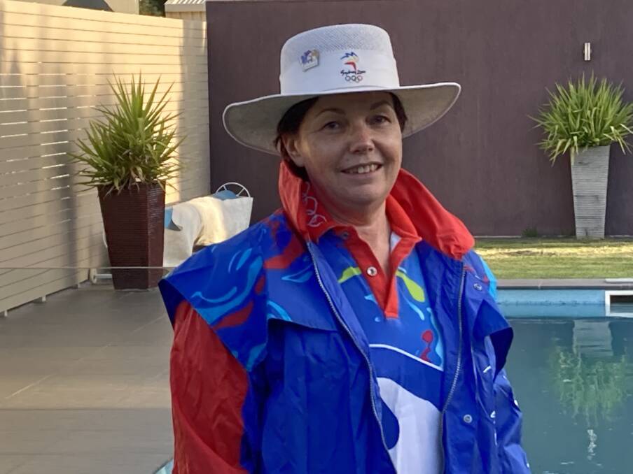 BACK AT IT: Leeton physio Sally Hill returns to her uniform to commemorate 20 years since she worked in the athletes village at the Sydney 2000 Olympics. Picture: supplied