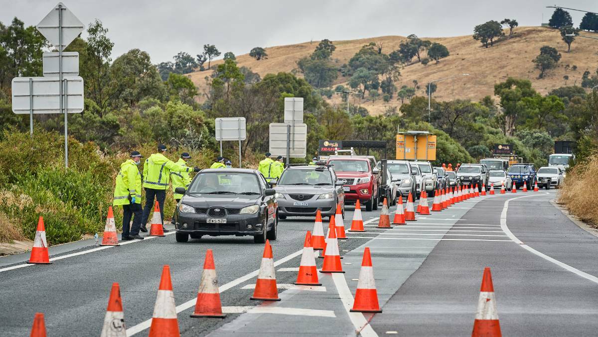 SLOWING THE SPREAD: Police at an ACT border checkpoint on the Federal Highway in 2021. Picture: Matt Loxton