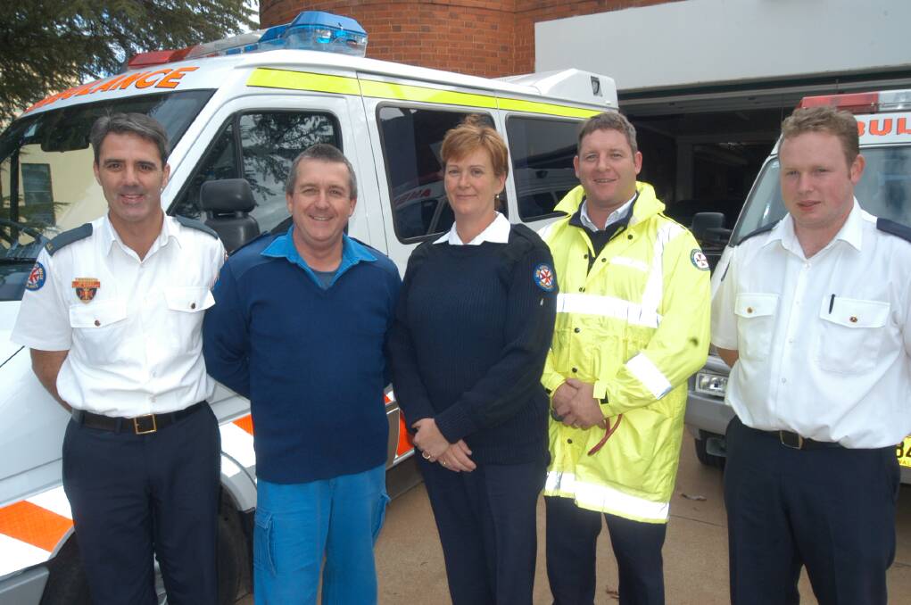 2004: Paramedics at the Leeton ambulance station are proud to be considered working in the most trustworthy profession; (from left) Glen Robinson, station officer Chris Bailey, Peta Sinclair, Liam Ward and Matthew Simpson.